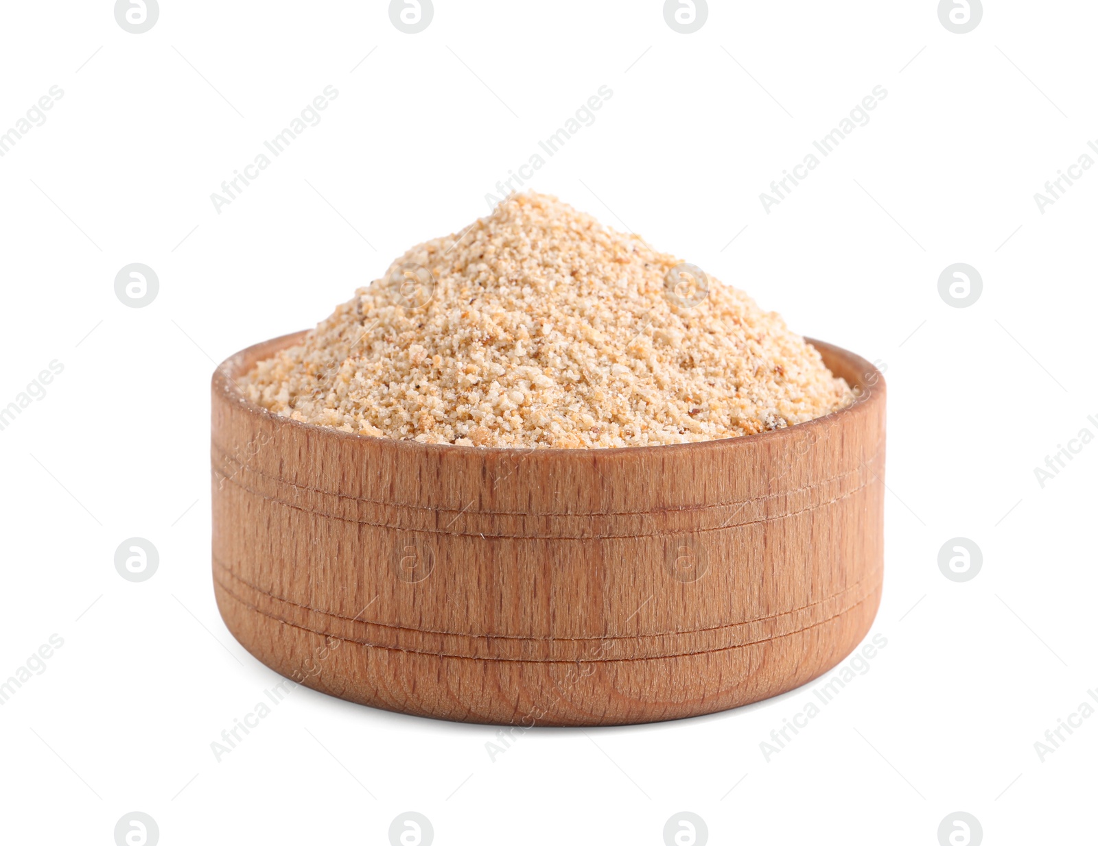 Photo of Fresh bread crumbs in wooden bowl isolated on white