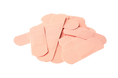 Photo of Medical sticking plasters isolated on white. First aid item
