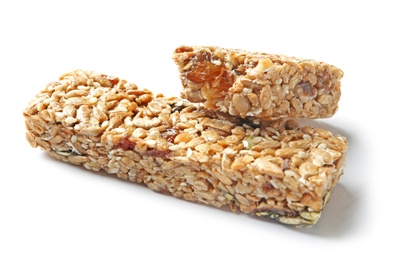 Photo of Grain cereal bars on white background. Healthy snack