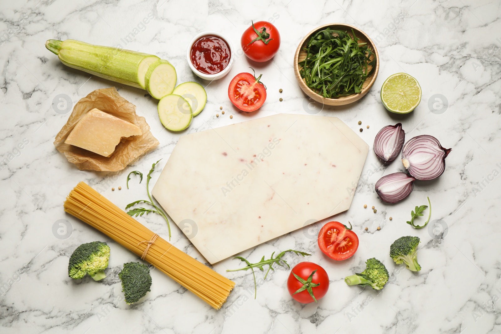 Photo of Flat lay composition with fresh products on marble table, space for text. Healthy cooking