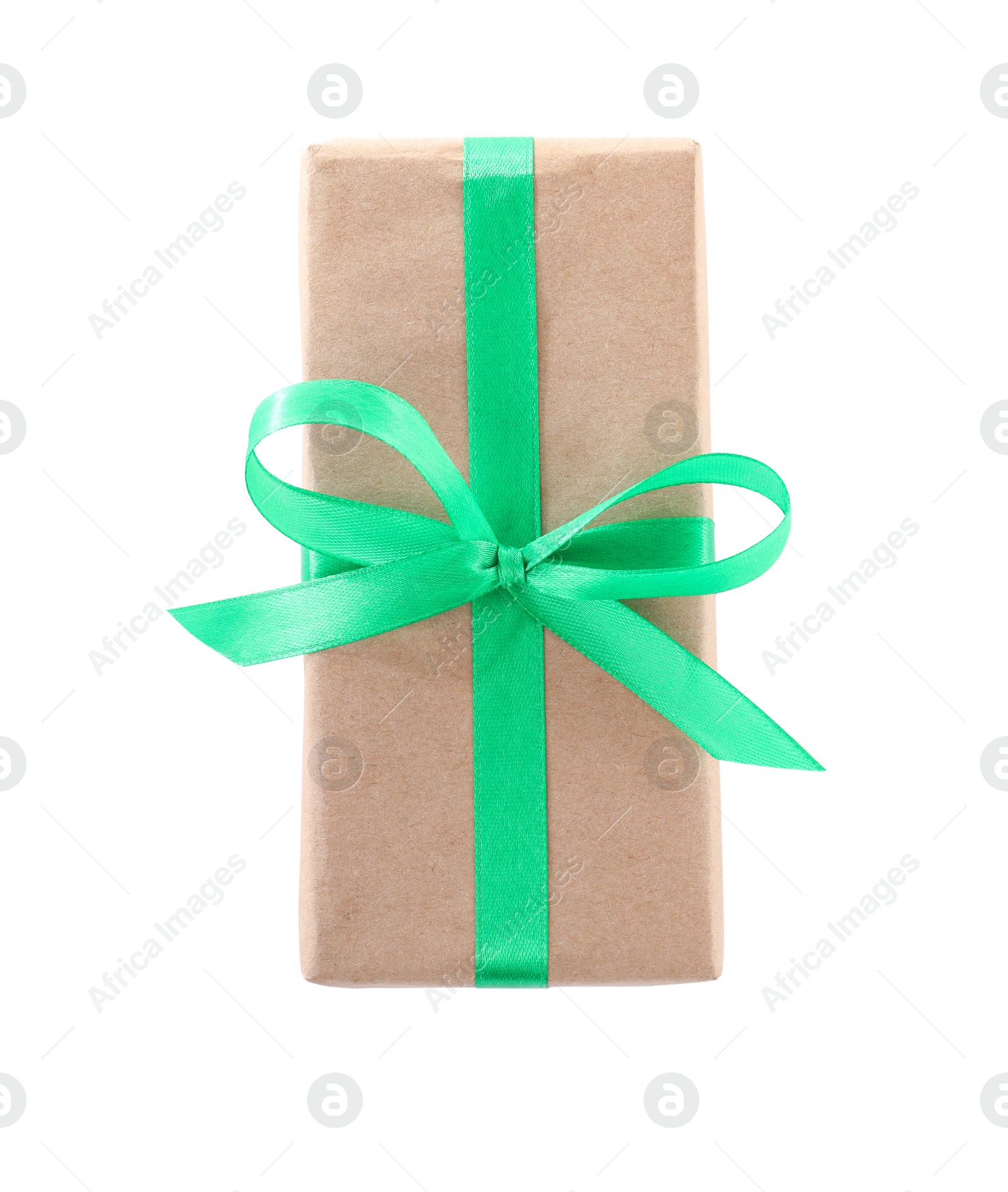 Photo of Christmas gift box decorated with ribbon bow on white background, top view