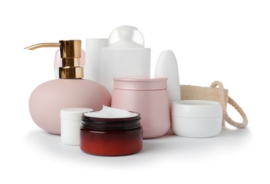 Photo of Different body care products and wisp on white background