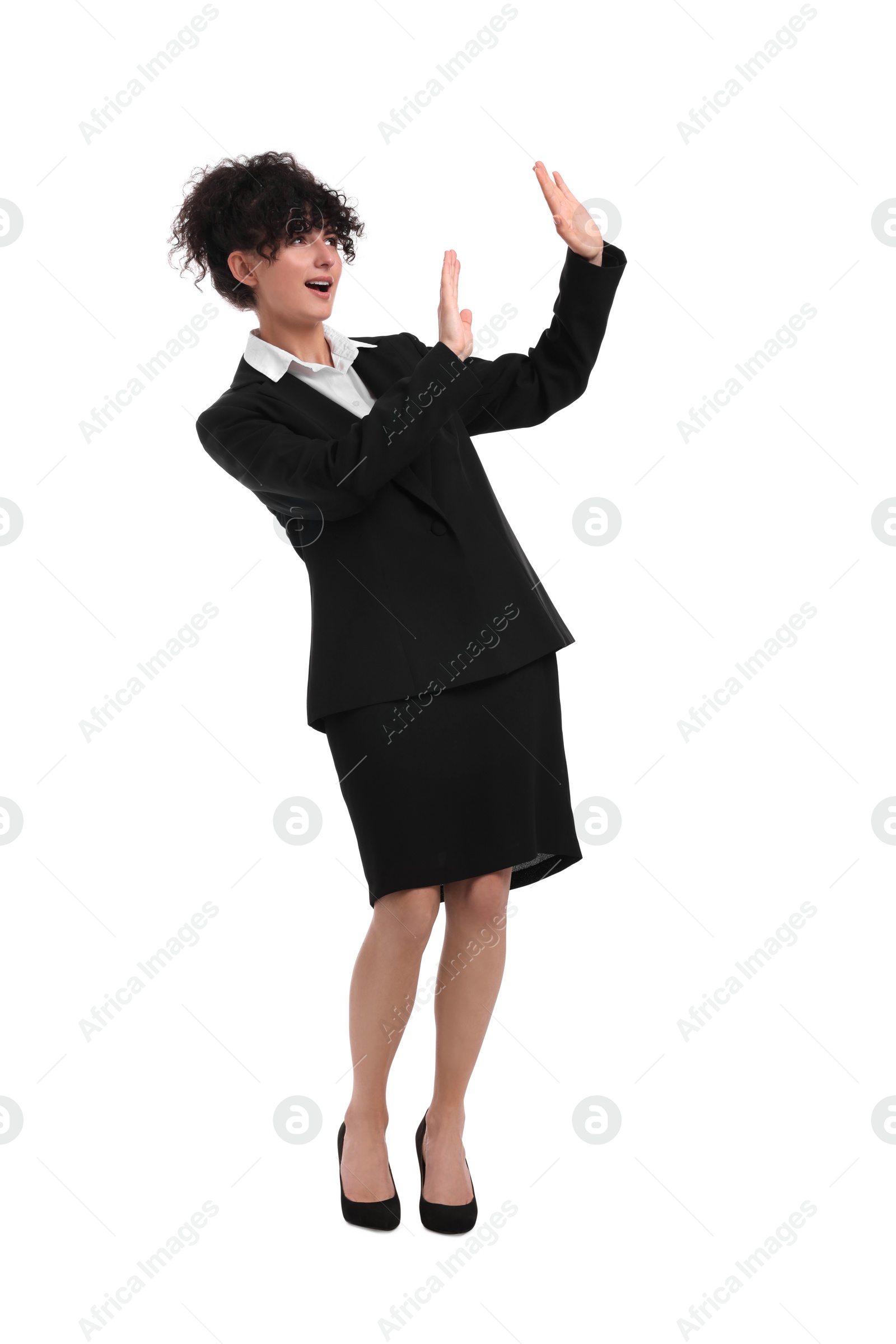 Photo of Beautiful young businesswoman in suit on white background