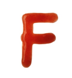 Photo of Letter F written with red sauce on white background