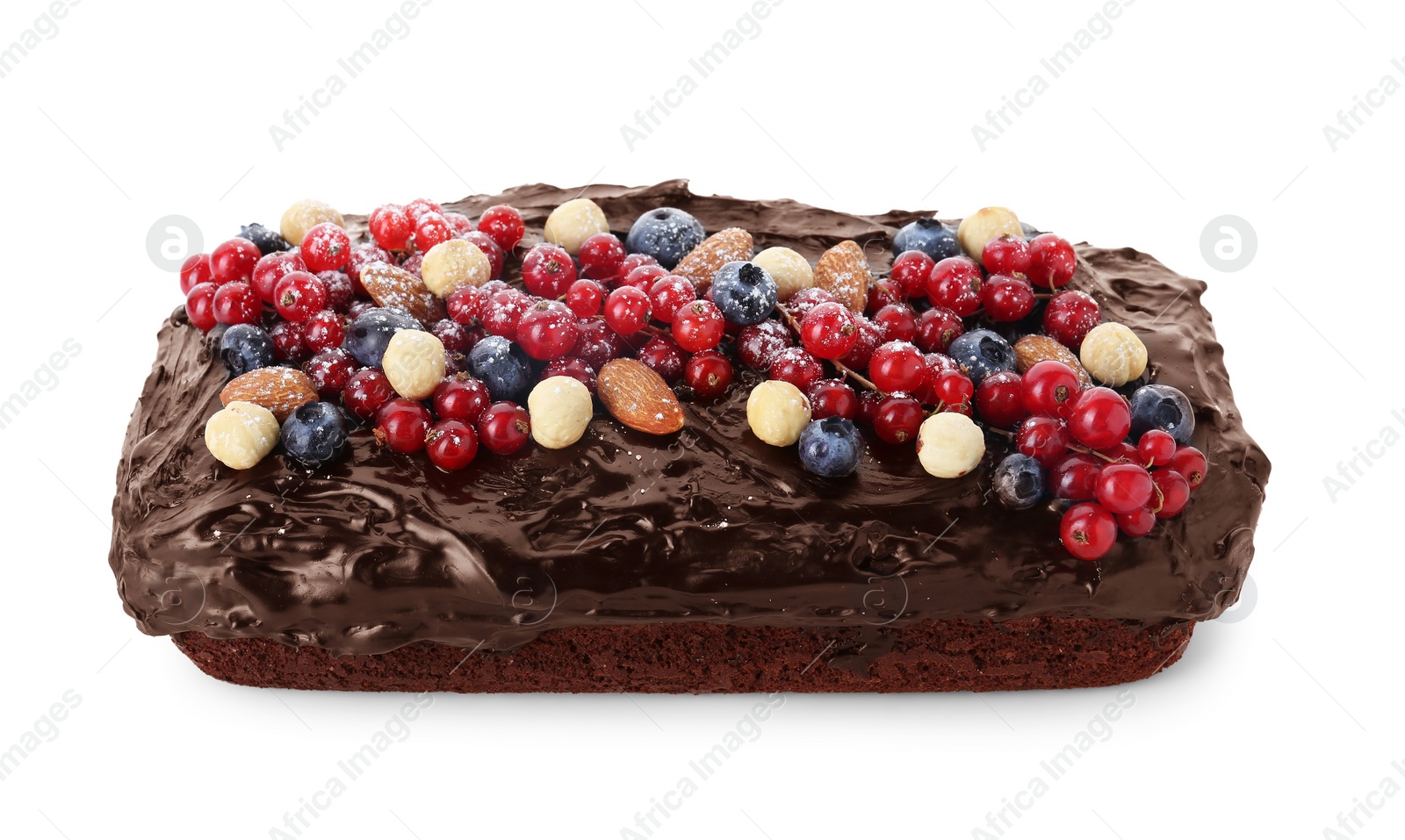 Photo of Delicious chocolate sponge cake with berries and nuts isolated on white