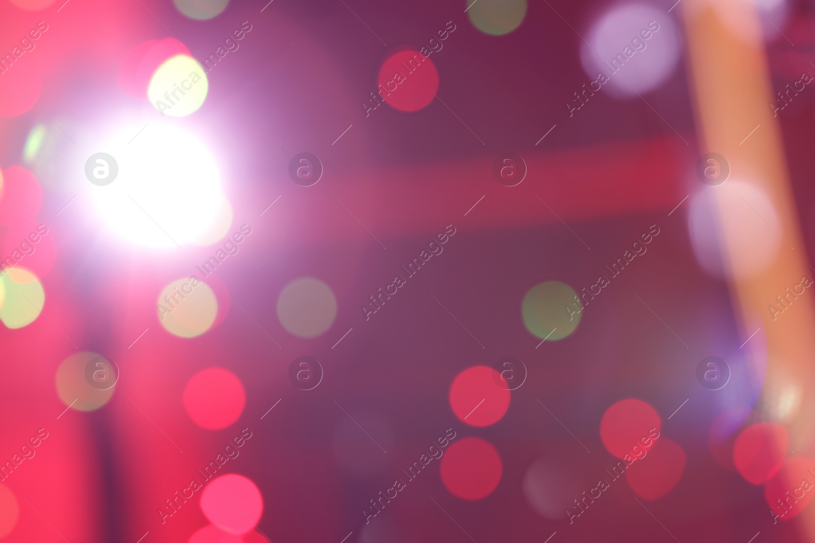 Photo of Blurred view of beautiful festive lights. Bokeh effect