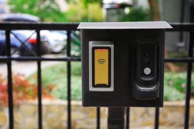 Photo of Parking intercom system outdoors, closeup. Space for text