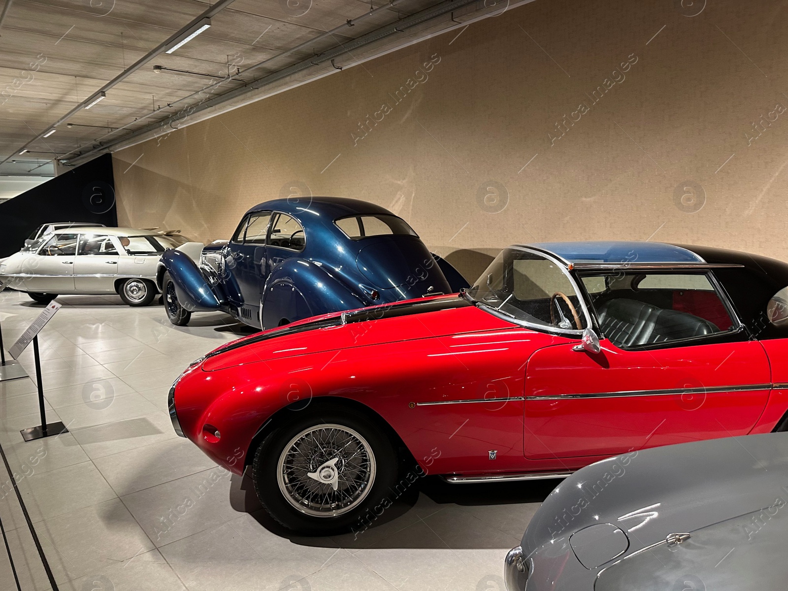 Photo of Hague, Netherlands - November 8, 2022: View of many different retro cars in Louwman museum