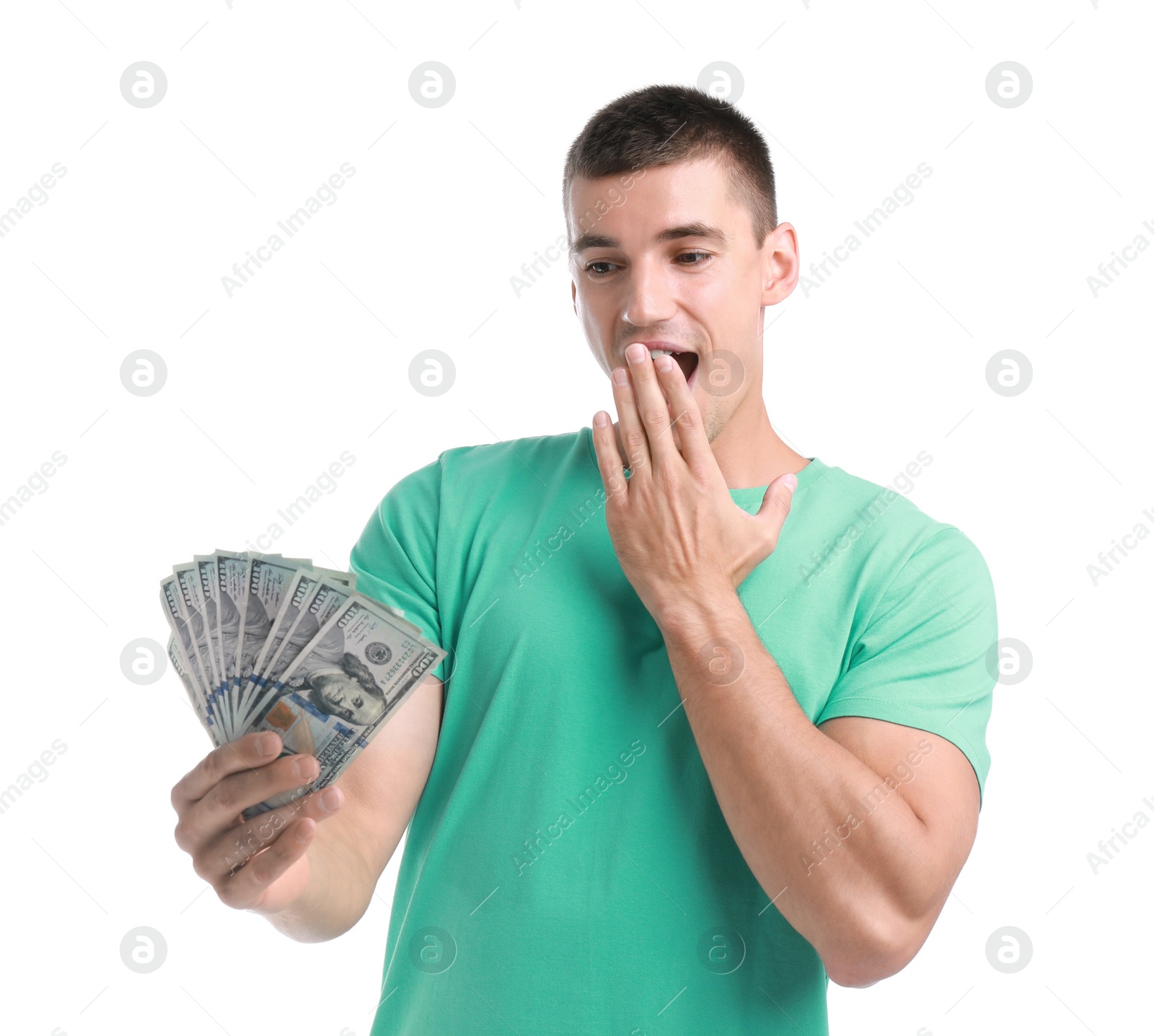 Photo of Handsome young man with dollars on white background