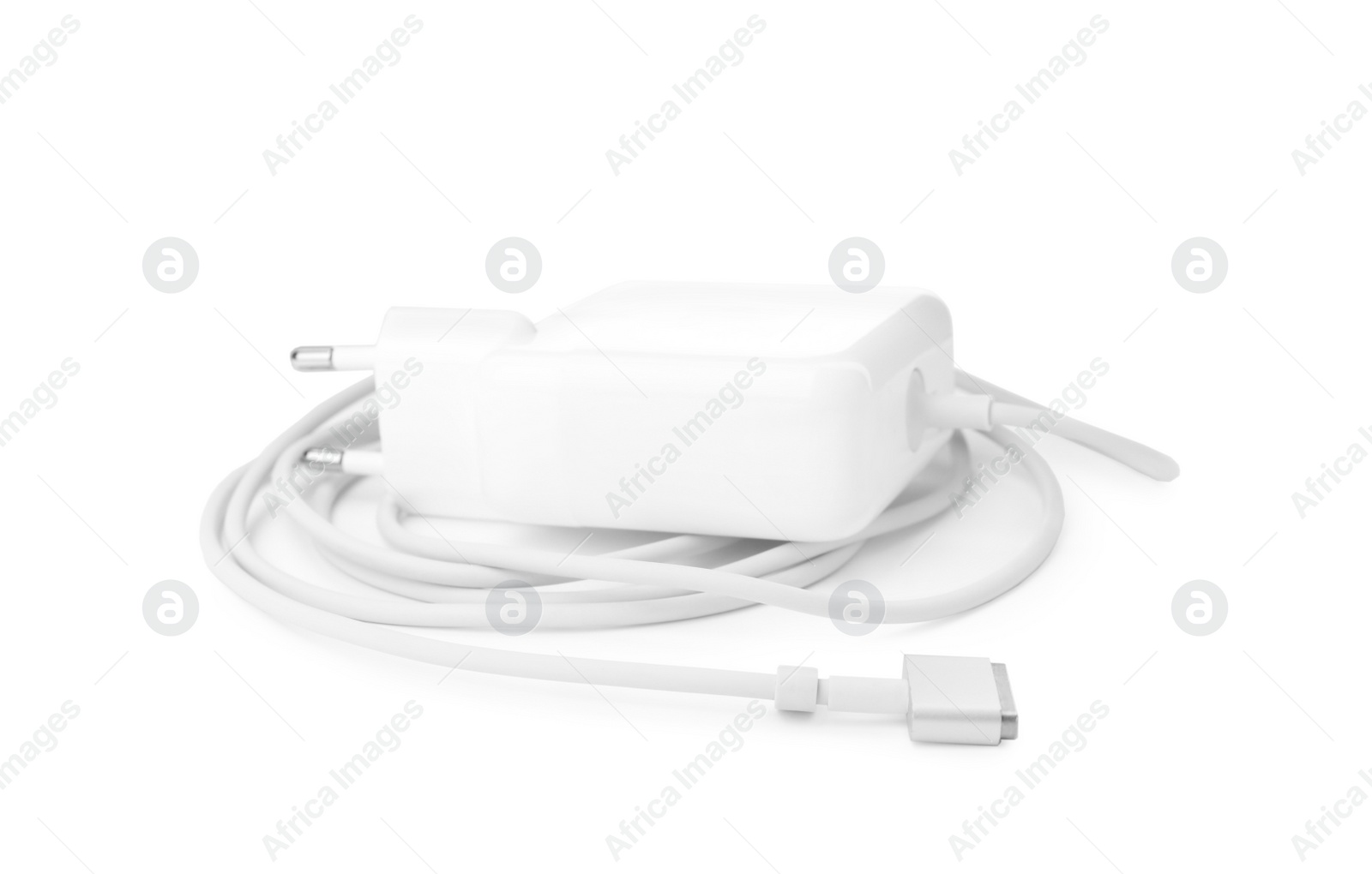 Photo of Laptop charger isolated on white. Modern technology