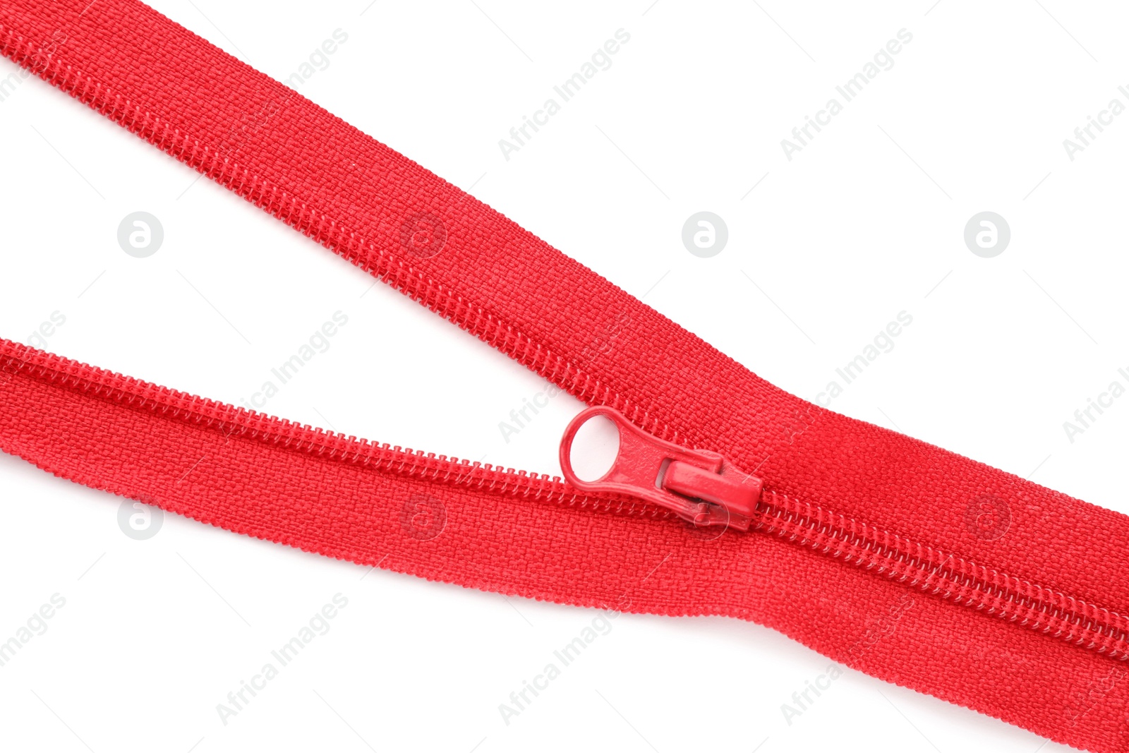 Photo of Red zipper on white background, top view