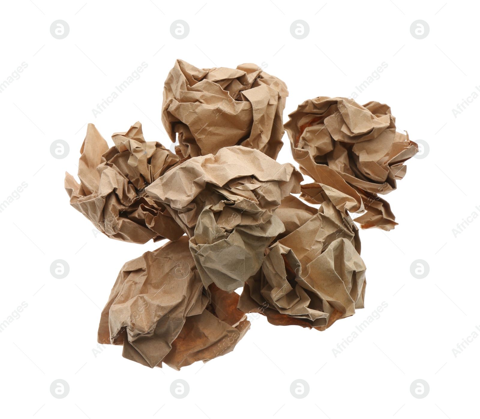 Photo of Crumpled sheets of kraft paper on white background, top view