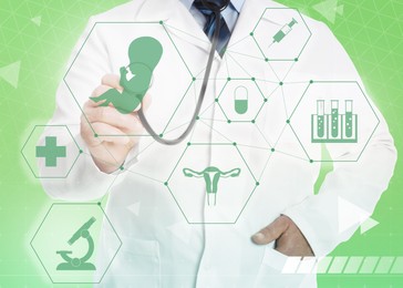Image of Doctor pointing at different virtual icons on light green background. Reproductive medicine concept