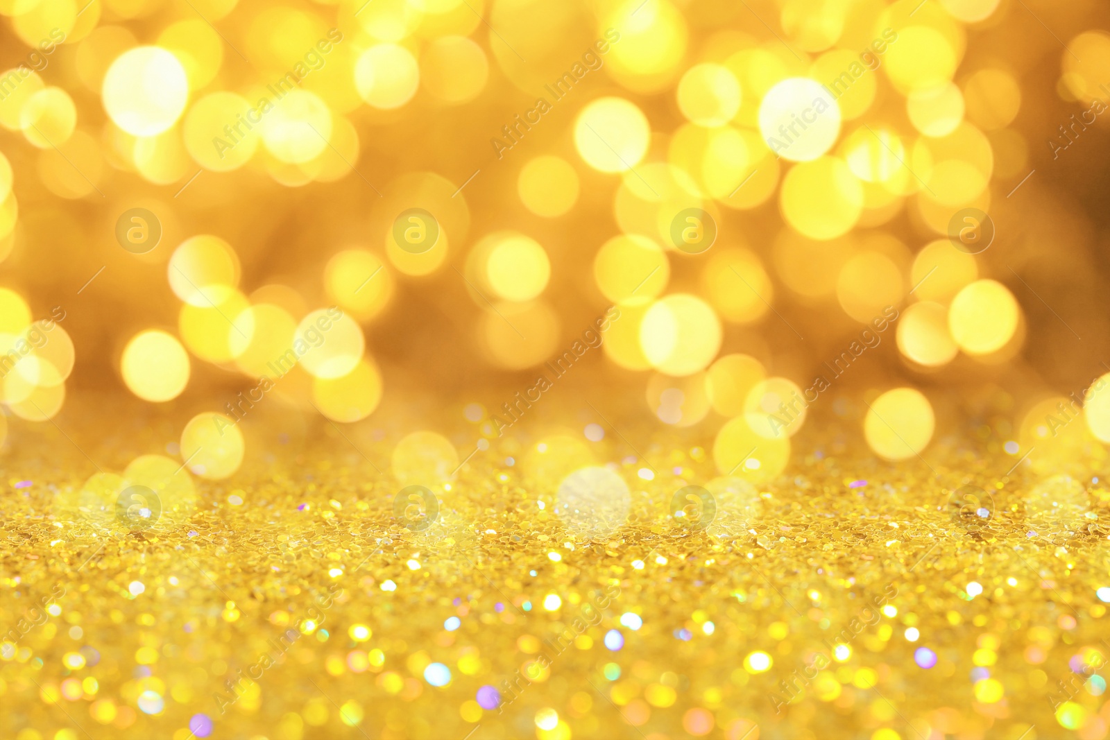 Image of Gold glitter with bokeh effect as abstract background