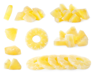 Set of canned pineapple rings and pieces on white background