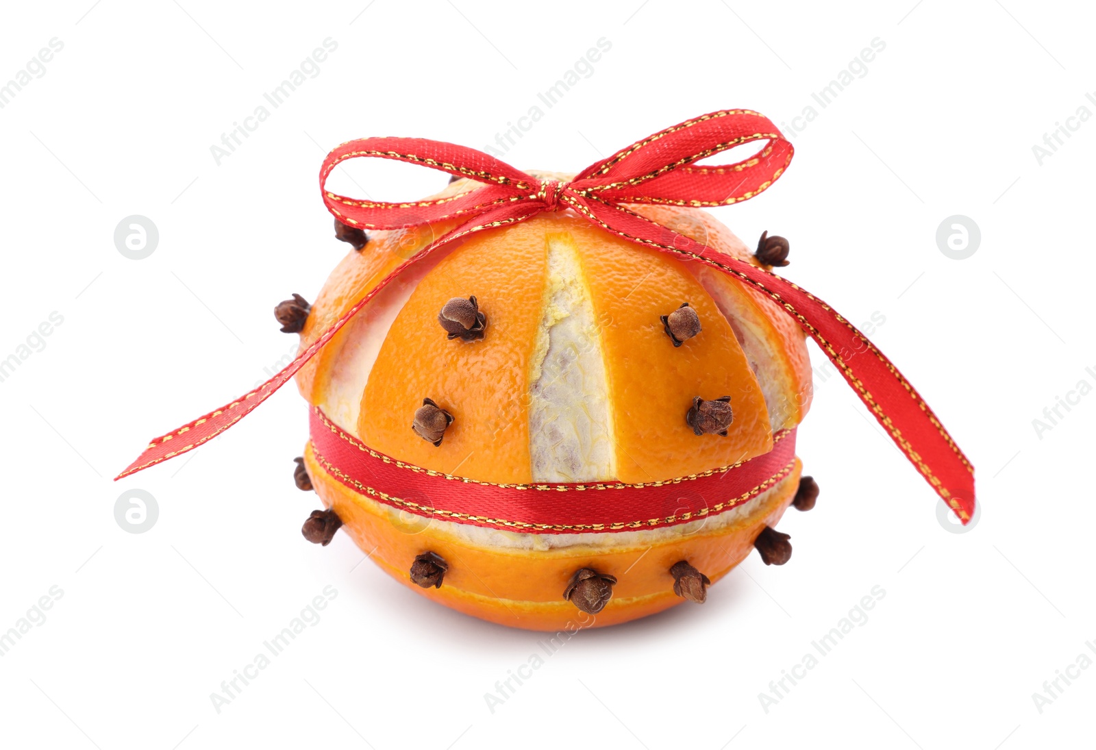 Photo of Pomander ball with red ribbon made of fresh tangerine and cloves isolated on white