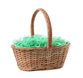 Photo of Easter basket with green paper filler isolated on white