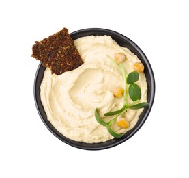 Photo of Bowl of delicious hummus with crispbread and chickpeas isolated on white, top view