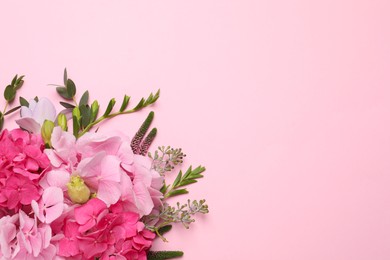 Photo of Beautiful composition with hortensia flowers on pink background, flat lay. Space for text