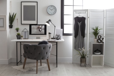 Photo of Stylish workplace with modern computer on desk