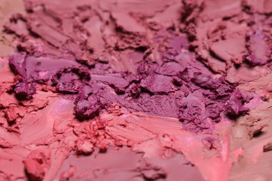 Photo of Texture of beautiful lipsticks as background, closeup