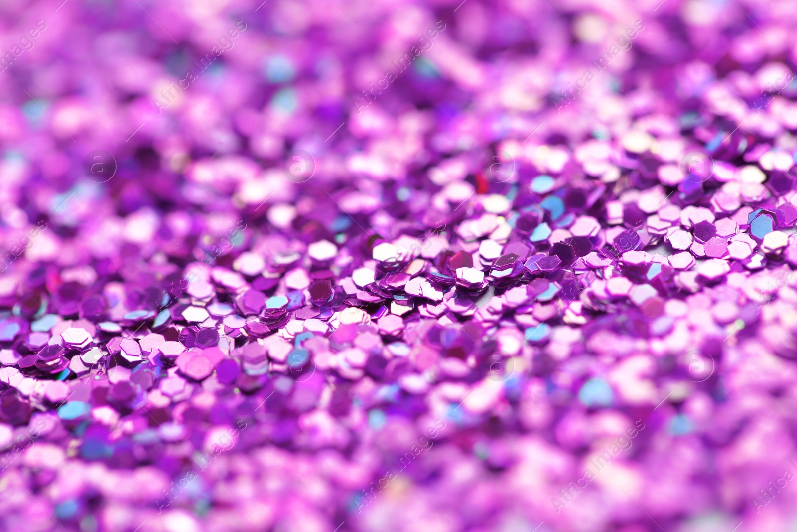 Photo of Many beautiful shiny paillettes as background, closeup