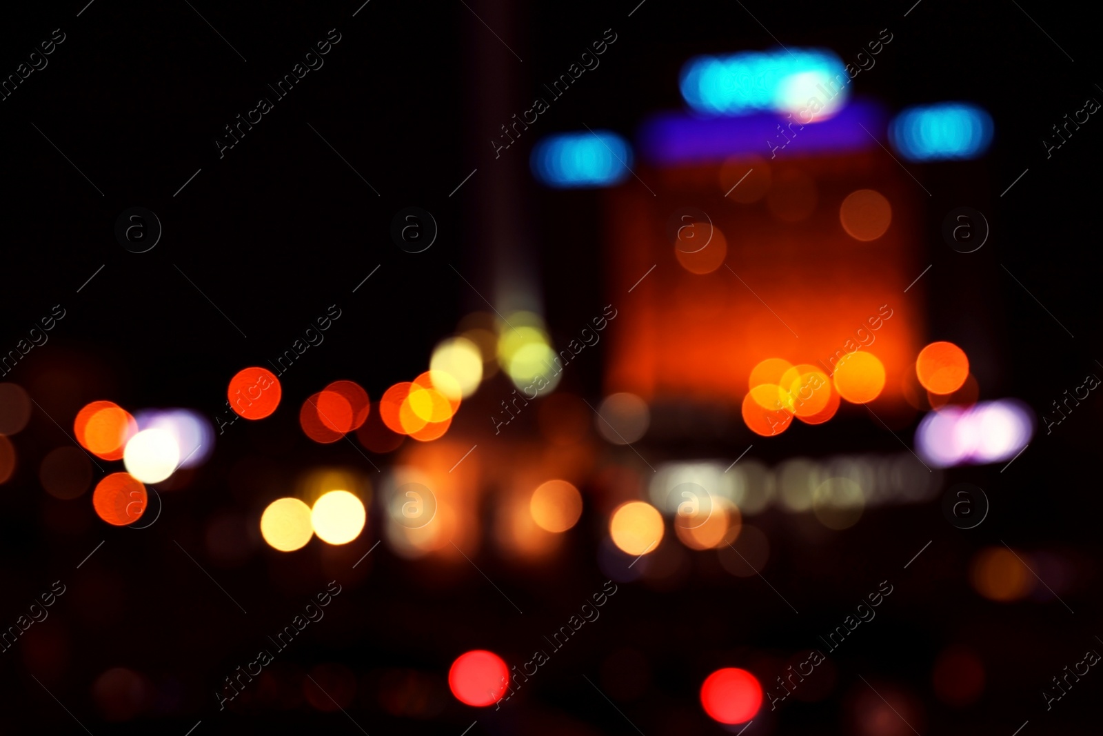 Photo of Blurred view of beautiful city at night. Bokeh effect