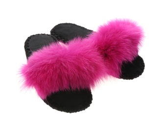 Photo of Pair of soft open toe slippers with pink fur on white background