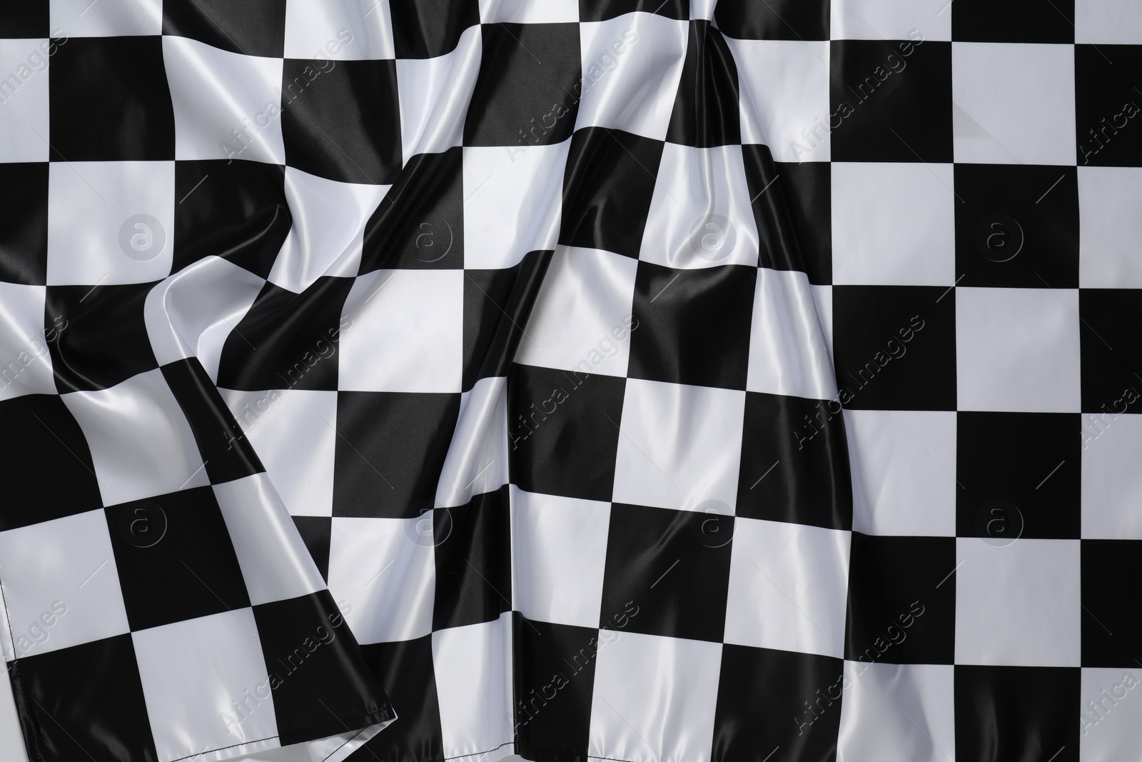 Photo of Checkered satin fabric as background, closeup view