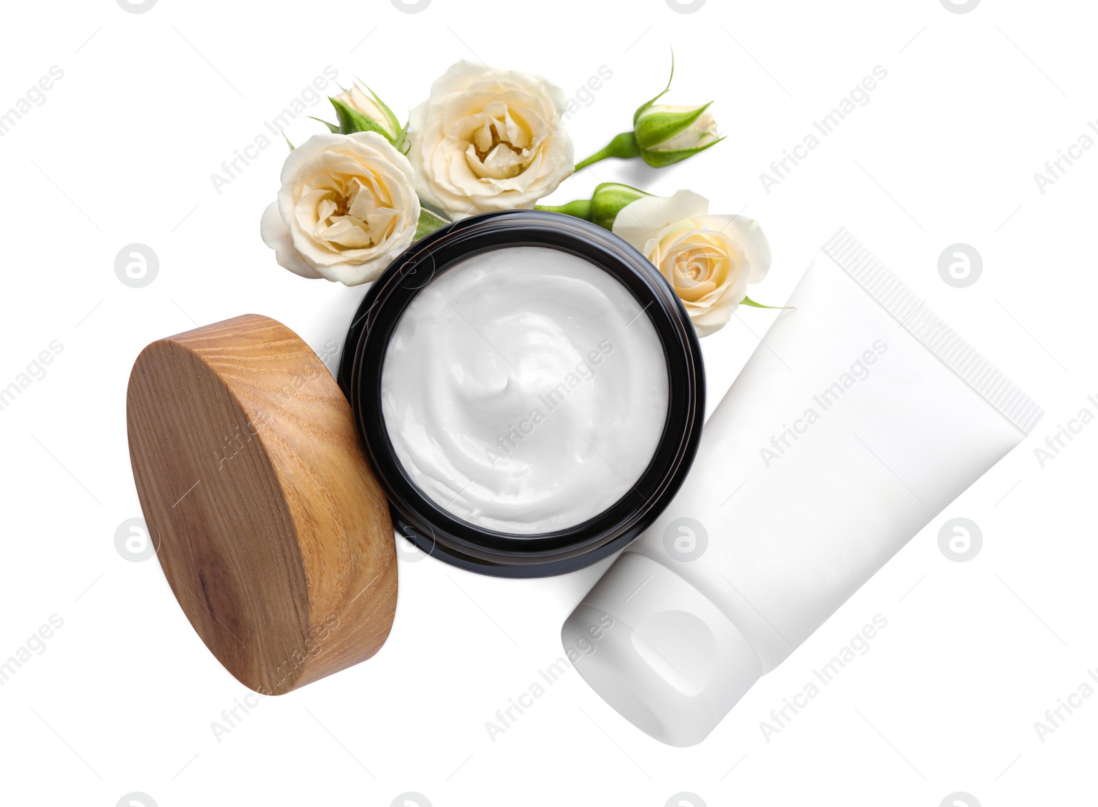 Photo of Different hand care cosmetic products and roses on white background, top view