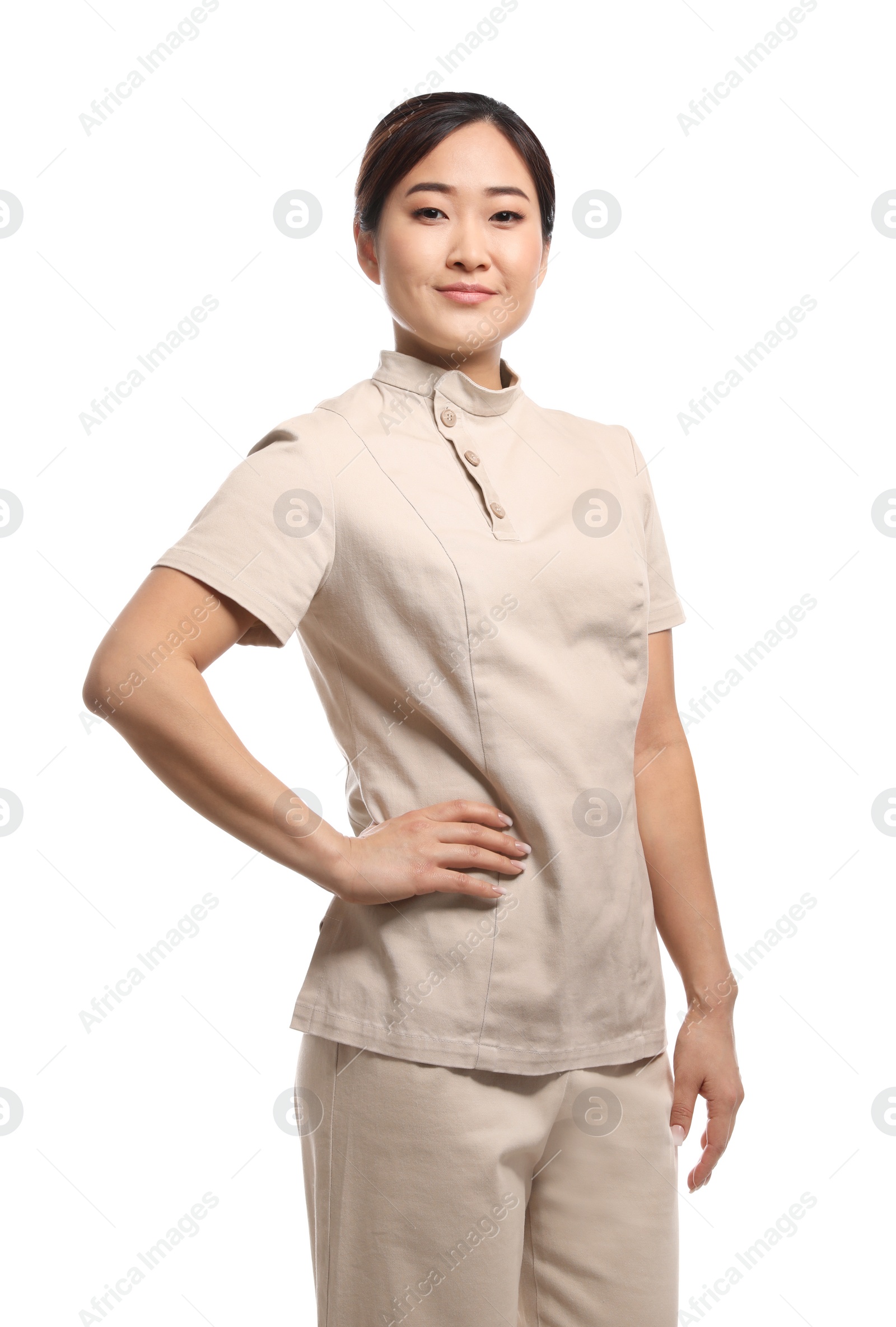 Photo of Professional masseuse in spa uniform on white background