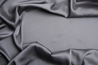 Photo of Texture of delicate black silk as background, top view