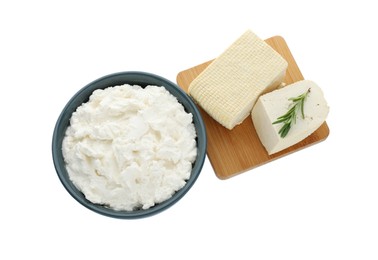 Photo of Different types of delicious tofu cheese with rosemary on white background, top view