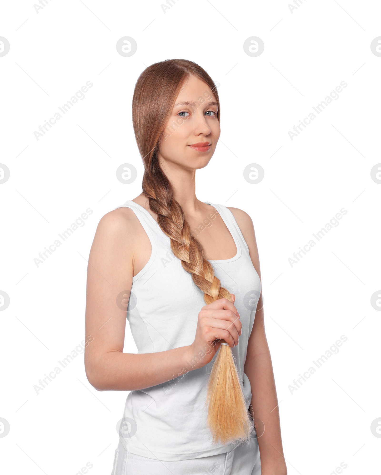 Photo of Teenage girl with strong healthy braided hair on white background