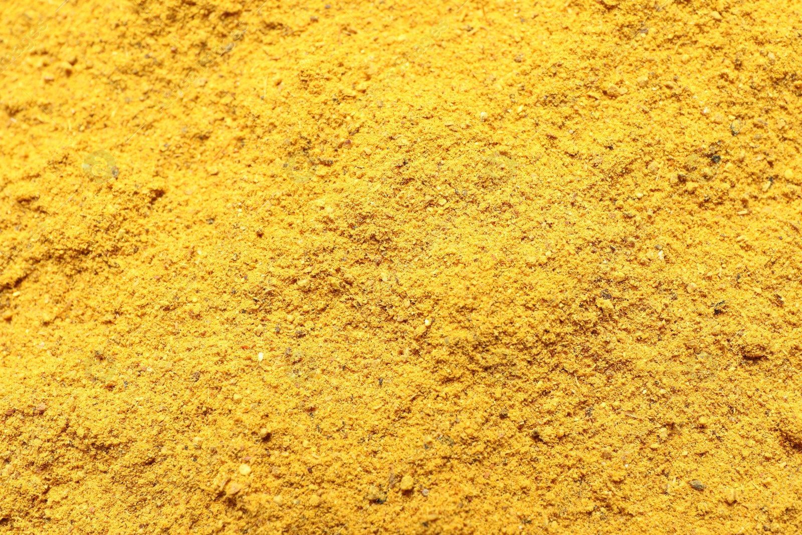 Photo of Dry curry powder as background, above view