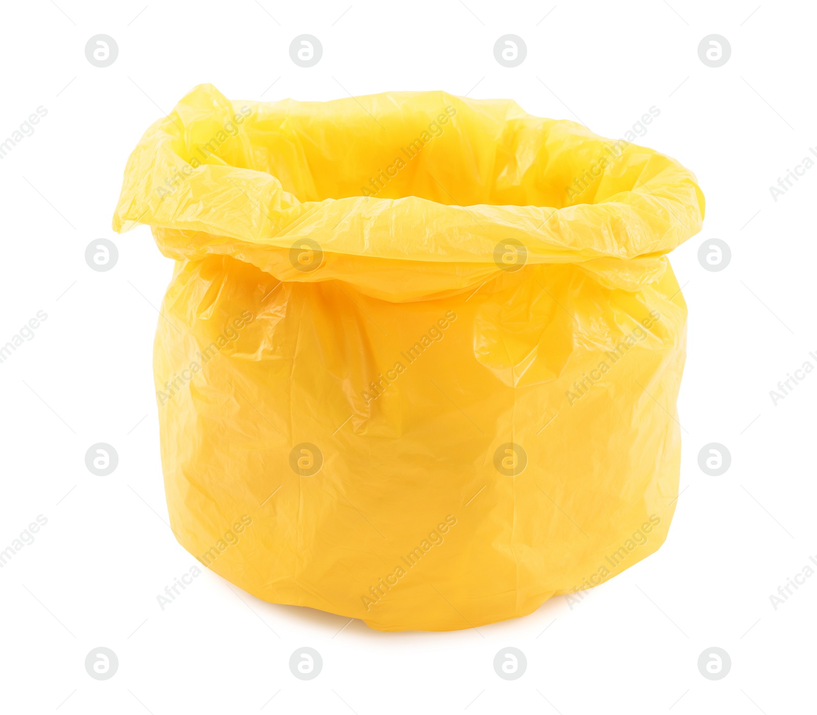 Photo of Yellow plastic garbage bag isolated on white