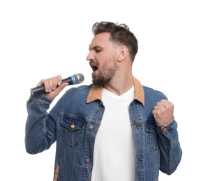 Handsome man with microphone singing on white background