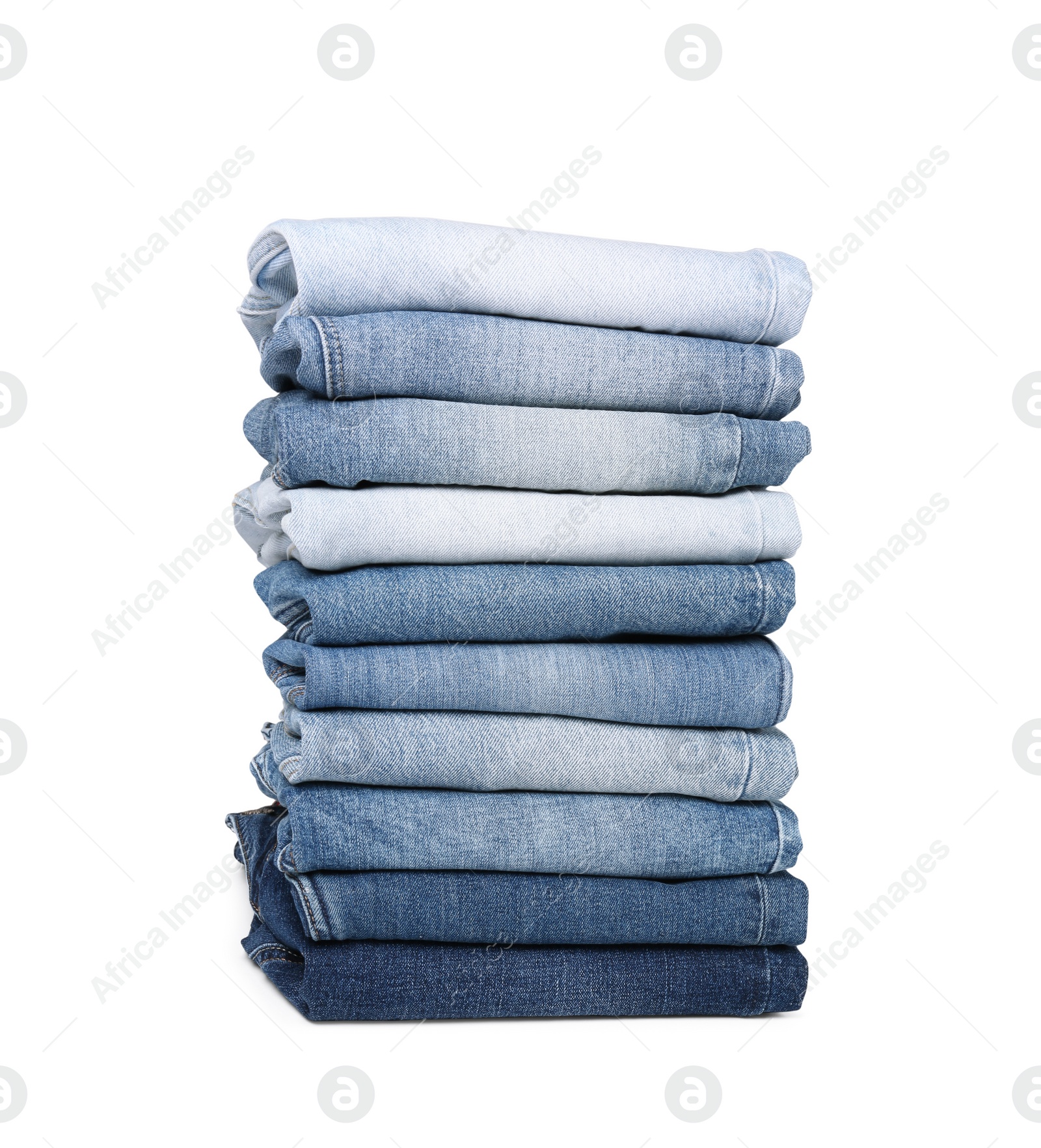 Image of Stack of different folded jeans isolated on white