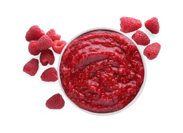 Photo of Raspberry puree in bowl and fresh berries on white background, top view