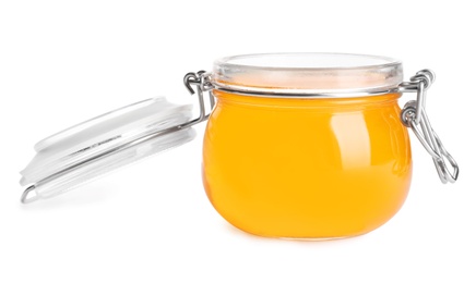 Tasty jelly dessert in glass jar on white background