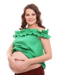 Young pregnant woman in casual clothes on white background