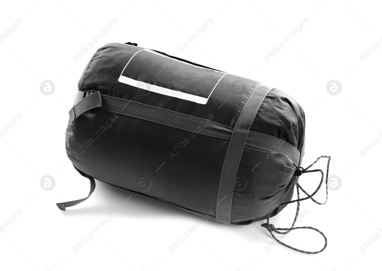 Photo of Rolled sleeping bag on white background. Camping equipment