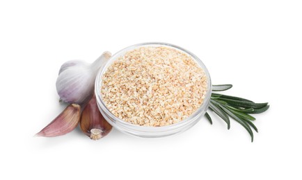 Photo of Dehydrated garlic granules in bowl, rosemary and unpeeled cloves isolated on white