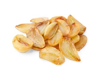 Photo of Pile of fried garlic cloves isolated on white
