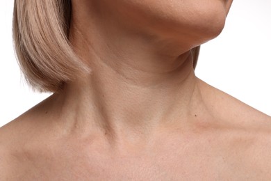 Woman with healthy skin on white background, closeup