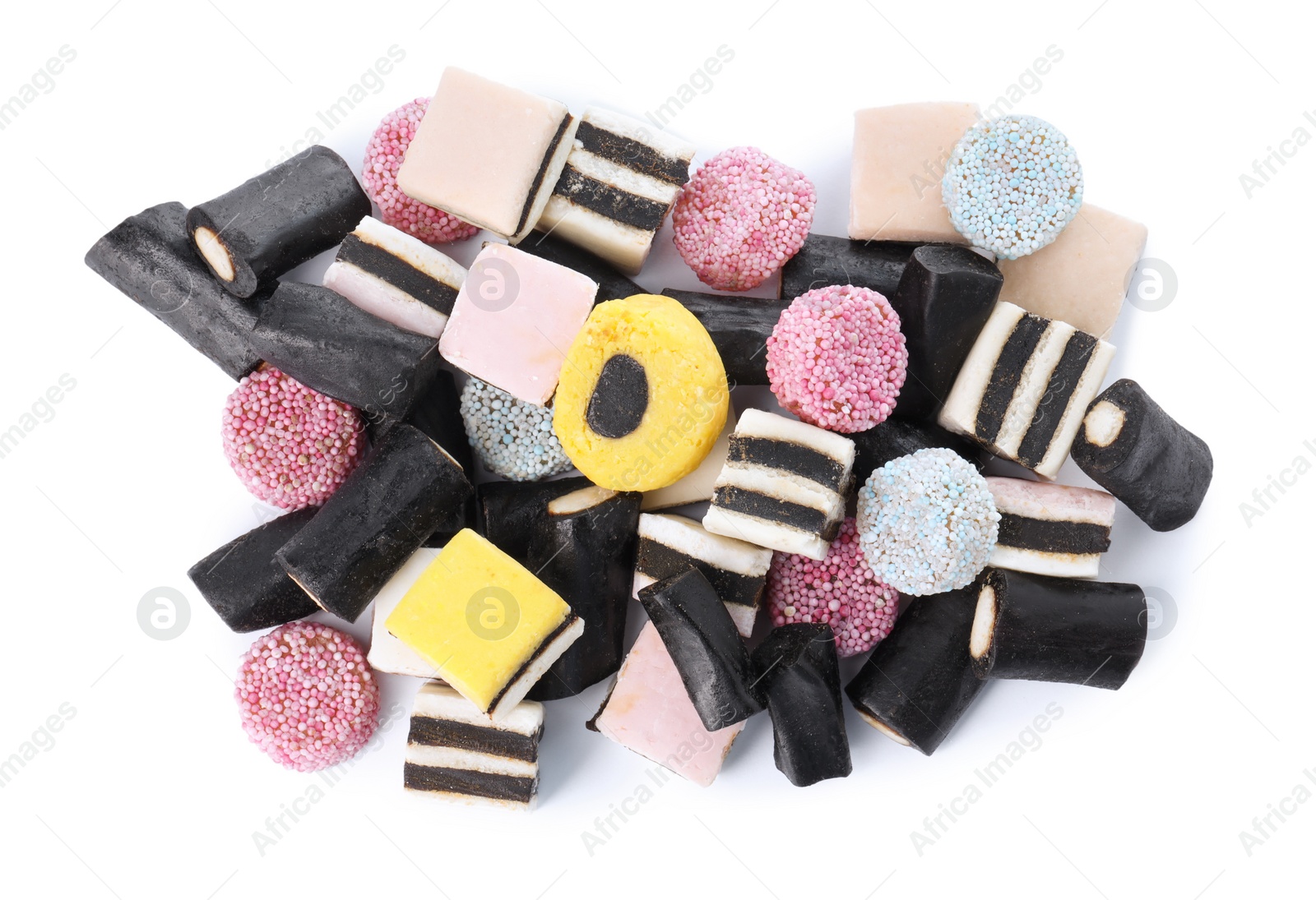 Photo of Many tasty liquorice candies isolated on white, top view