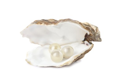 Photo of Open oyster shell with pearls on white background