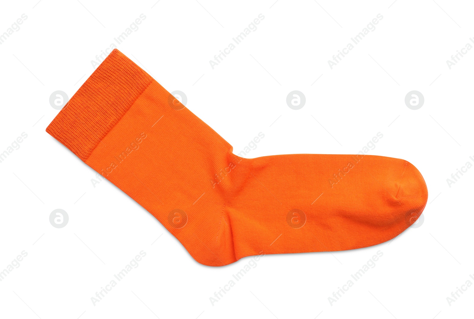 Photo of New orange sock isolated on white, top view. Footwear accessory