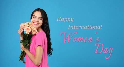 Image of Happy Women's Day, Charming lady holding bouquet of beautiful flowers on light blue background