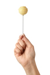 Photo of Woman holding sweet cake pop on white background, closeup